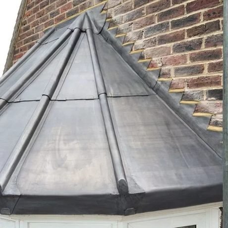 Hand-dressed lead roof with welted seams on a Surrey property by Tresan Roofing